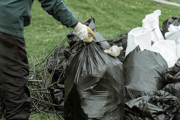 Close up of trash bags filled with trash after cleaning the environment.
